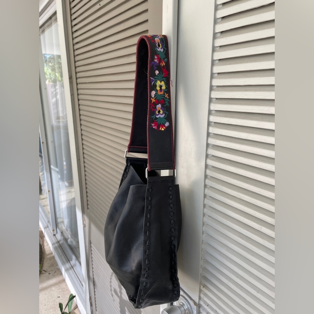 Genuine, leather, black hobo bag with floral embroidered straps